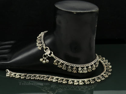 Vintage 10.5-inch sterling silver anklet with tribal charm, handmade ethnic jewelry, featuring intricate tribal ornament design.