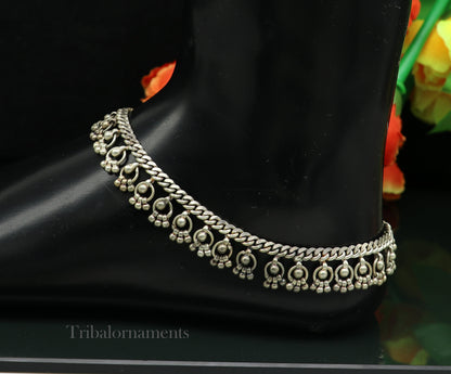 Vintage 10.5-inch sterling silver tribal anklet with charms, handmade ethnic jewelry, worn and aged for a rustic antique look.