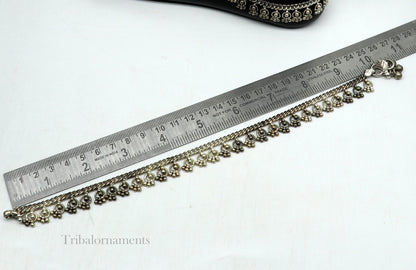 Vintage 10.5-inch handmade sterling silver anklet with tribal charms, ethnic tribal jewelry, worn and antique style.