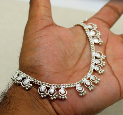 Handmade 10-inch sterling silver ankle bracelet with tiny drop charms, stylish jewelry from TRIBAL ORNAMENTS.