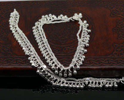 Sterling silver 10-inch double chain anklets with waved jingle bells and charms, tribal-style belly dance jewelry from Tribal Ornaments.