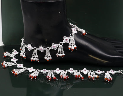 Sterling silver vintage-style ankle bracelet with handmade chain and hanging dangler, featuring genuine jewelry design.
