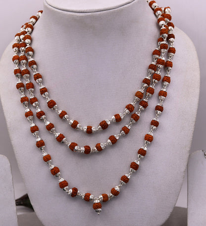 Handmade sterling silver japp mala necklace with 108 natural Rudraksh beads, 54 inches long, from Rajasthan, India.