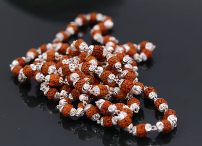 Handmade sterling silver Japp Mala necklace with 108 natural Rudraksh beads, 54 inches long, from Rajasthan, India.