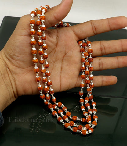 Handmade 108 Rudraksha japp mala necklace with sterling silver beads, 54 inches long, ideal for chanting and meditation.