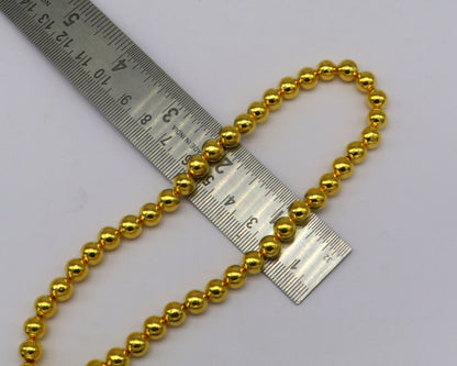10pcs 22kt yellow gold handmade 7mm plain beads for jewelry making, loose waxed beads, and custom gold jewelry findings.