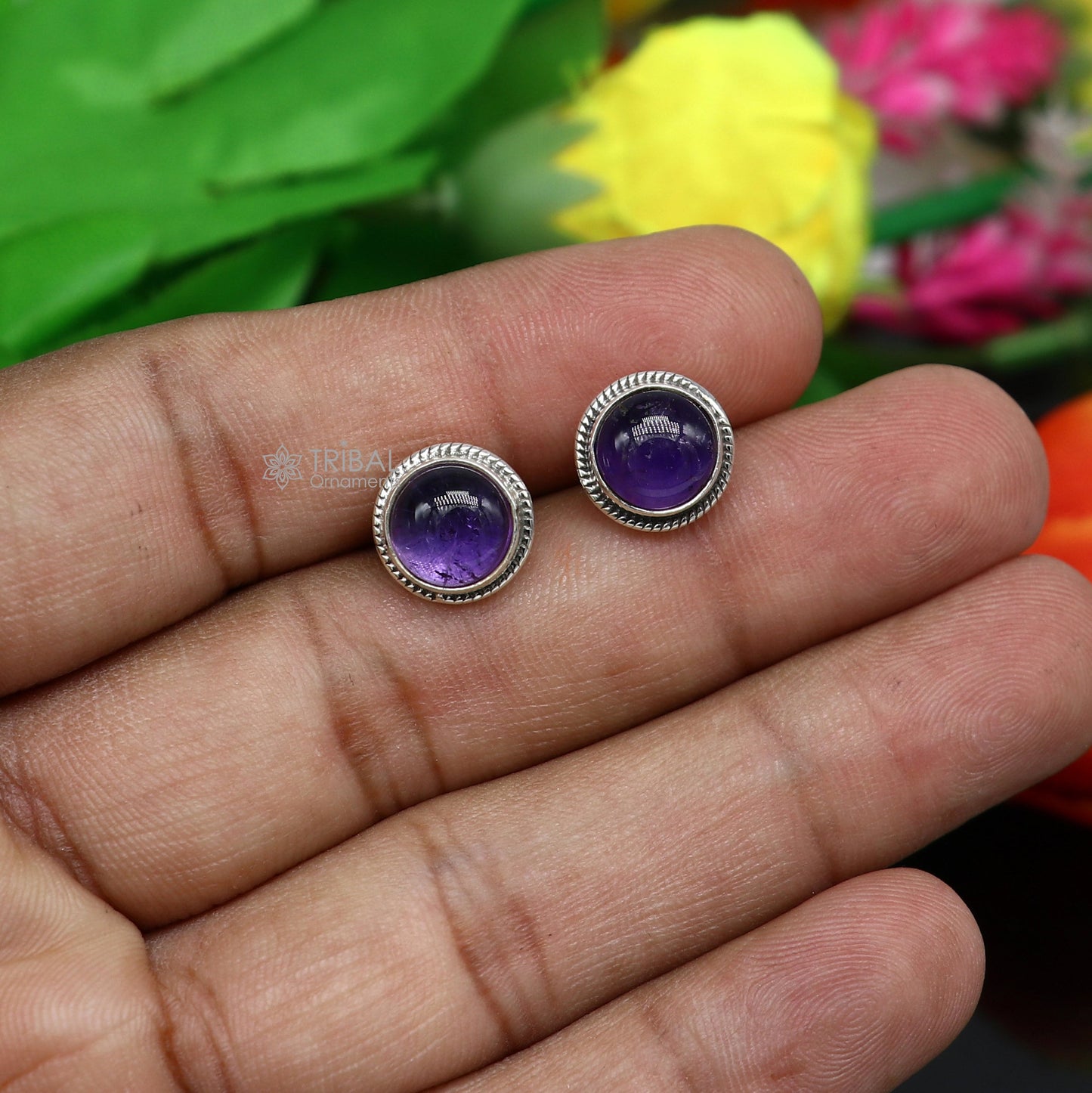 Sterling silver 11mm round amethyst stud earrings by Tribal Ornaments, unisex jewelry with vibrant purple gemstone, daily wear accessory.