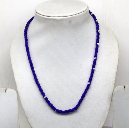 Sterling silver galaxy necklace with triple strands of blue semi-precious stone beads and silver bead accents.