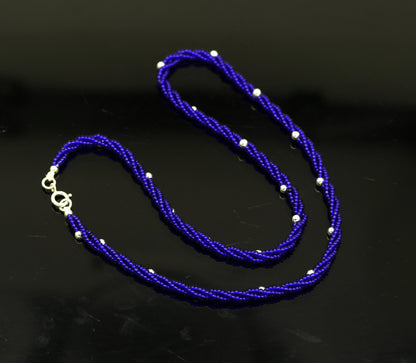 18.5-inch sterling silver galaxy necklace with triple strands, blue semi-precious stones, and silver beads from Tribal Ornaments.