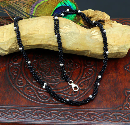 18-inch TRIBAL ORNAMENTS silver galaxy necklace with triple strands, black cut stones, and silver beads, showcasing intricate design.