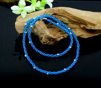 18-inch sterling silver galaxy necklace with triple strands, blue semi-precious stone beads, and silver accents by Tribal Ornaments