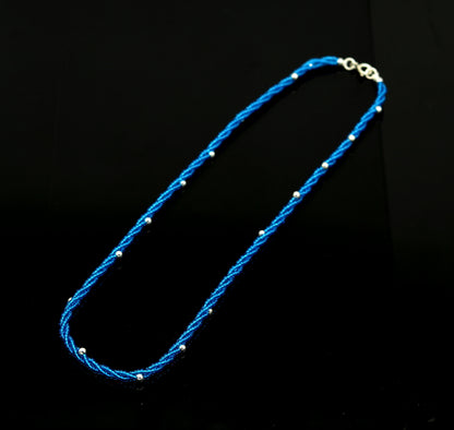 Sterling silver galaxy necklace with triple strands of blue semi-precious stone beads and silver accents by Tribal Ornaments