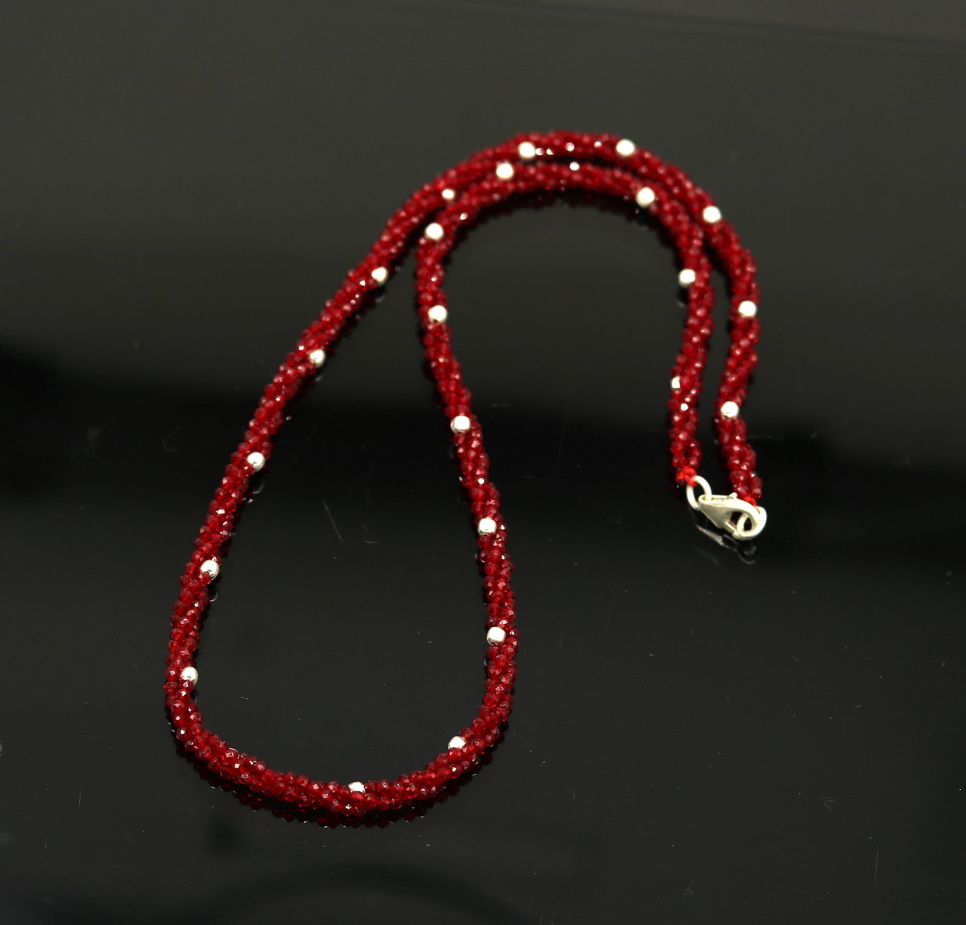 18-inch customized beaded necklace by TRIBAL ORNAMENTS featuring triple strands, semiprecious stones, and silver beads with galaxy design