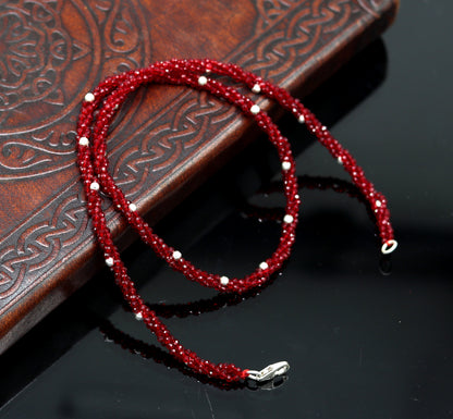 18-inch tribal beaded necklace set with triple strands, semiprecious cut stones, and silver beads, featuring a galaxy-inspired design.