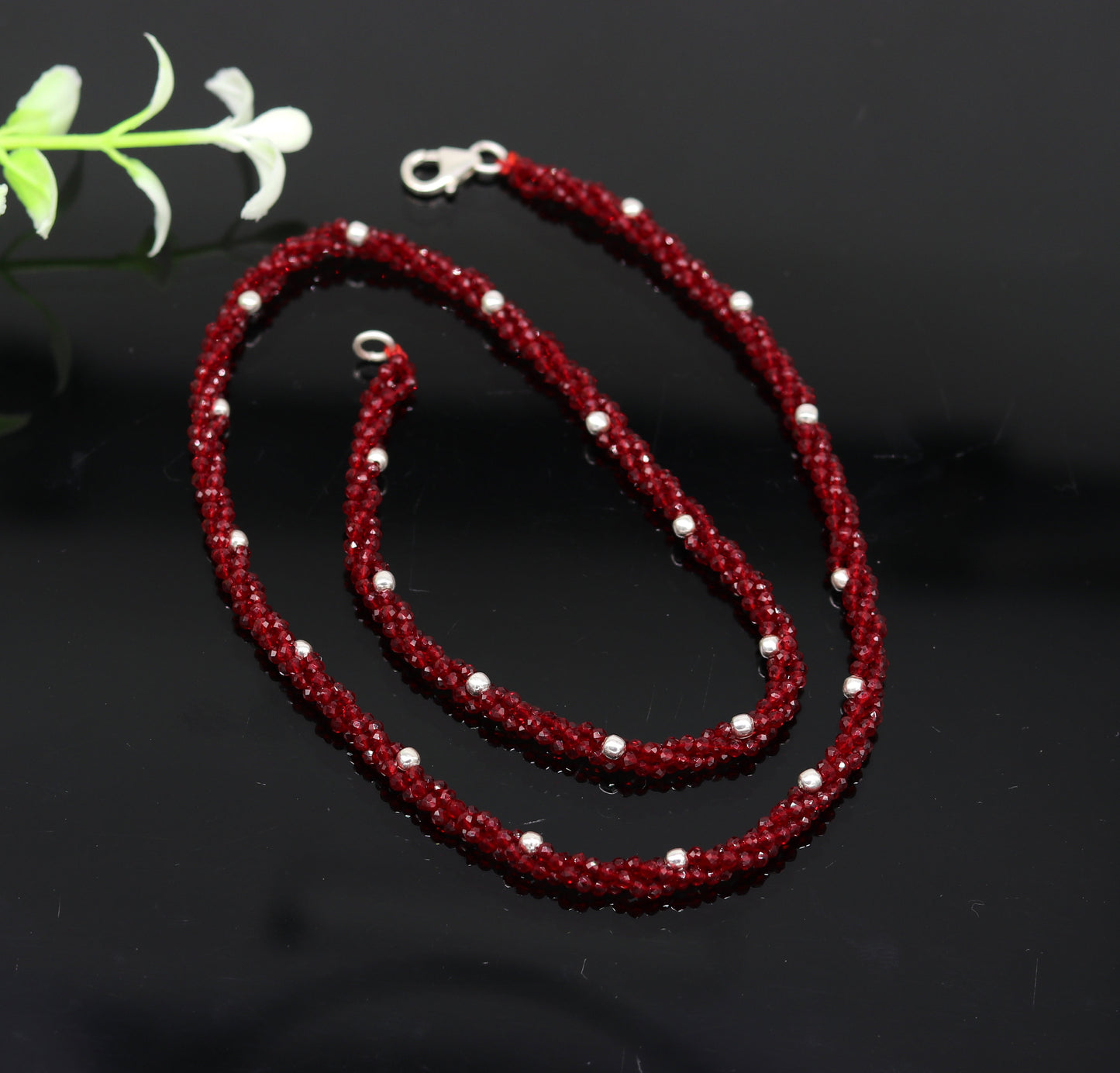 18-inch tribal beaded necklace set with triple strands of semiprecious cut stones and silver beads, galaxy-inspired design.