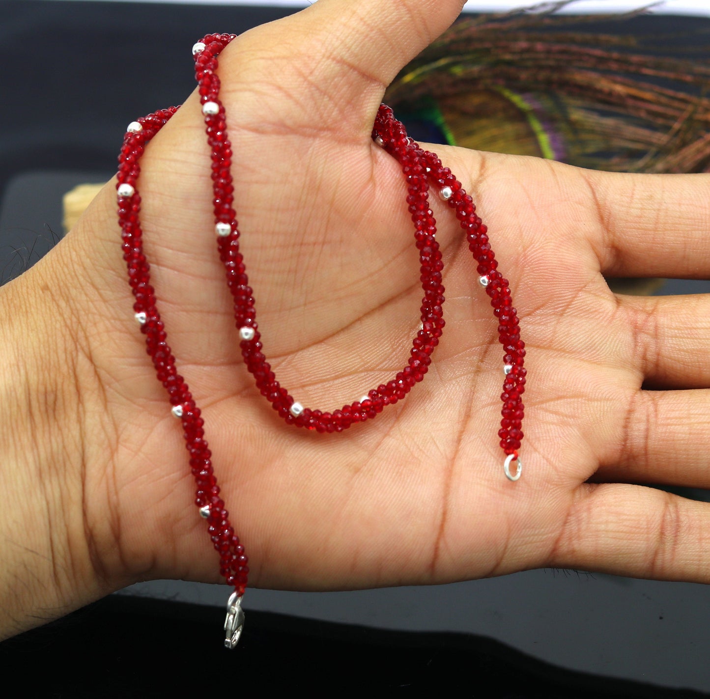 18-inch tribal beaded necklace set with triple strands of semiprecious cut stones and 925 silver beads, galaxy-inspired design.