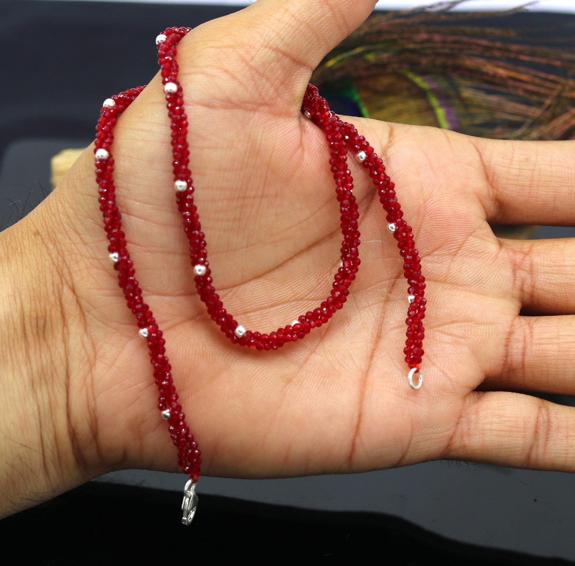 18-inch tribal beaded necklace set with triple strands of semiprecious cut stones and 925 silver beads, galaxy-inspired design.