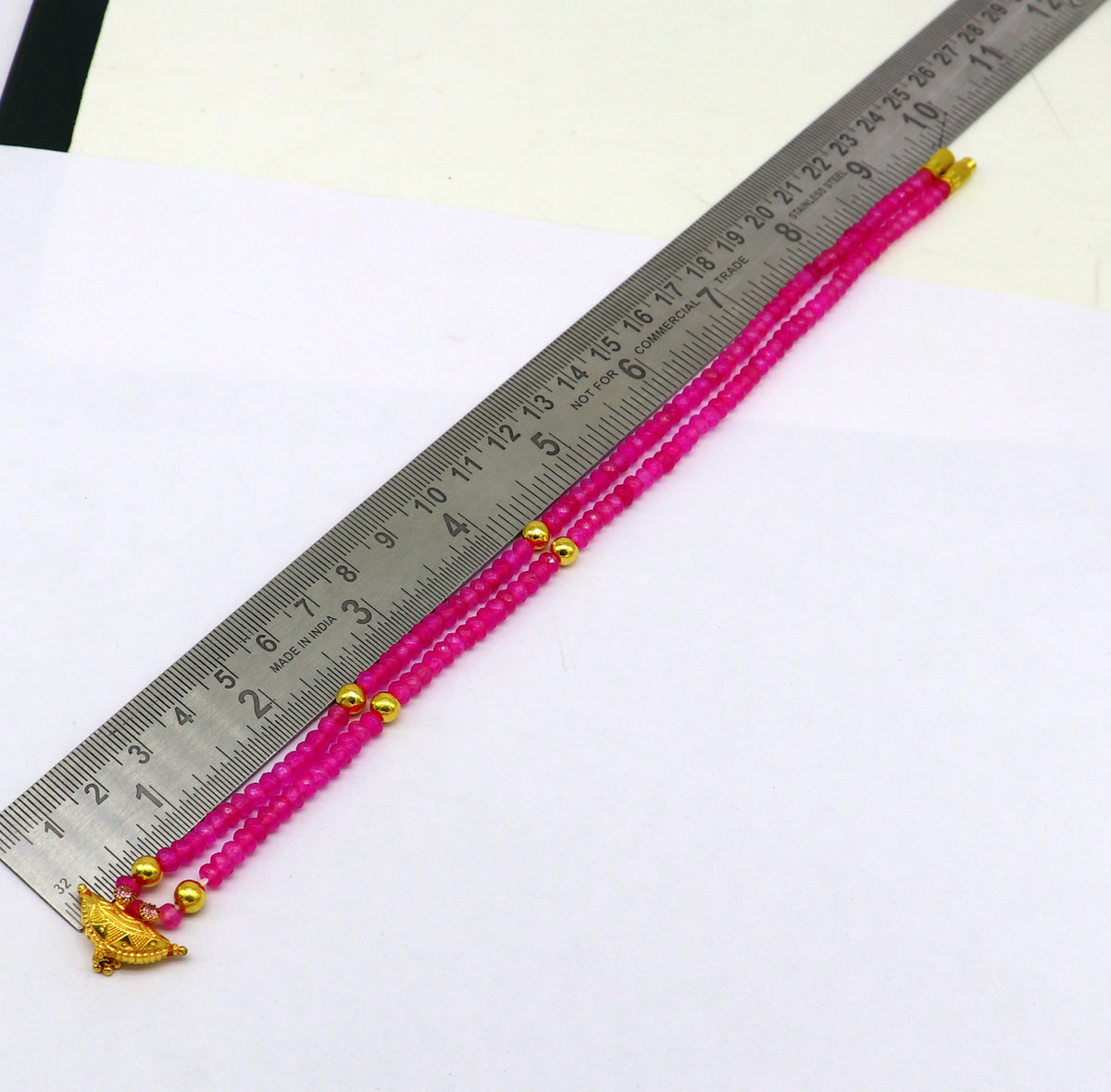 18-inch faceted pink beaded necklace with 20kt yellow gold amulet pendant, tribal ethnic jewelry for brides or special occasions.