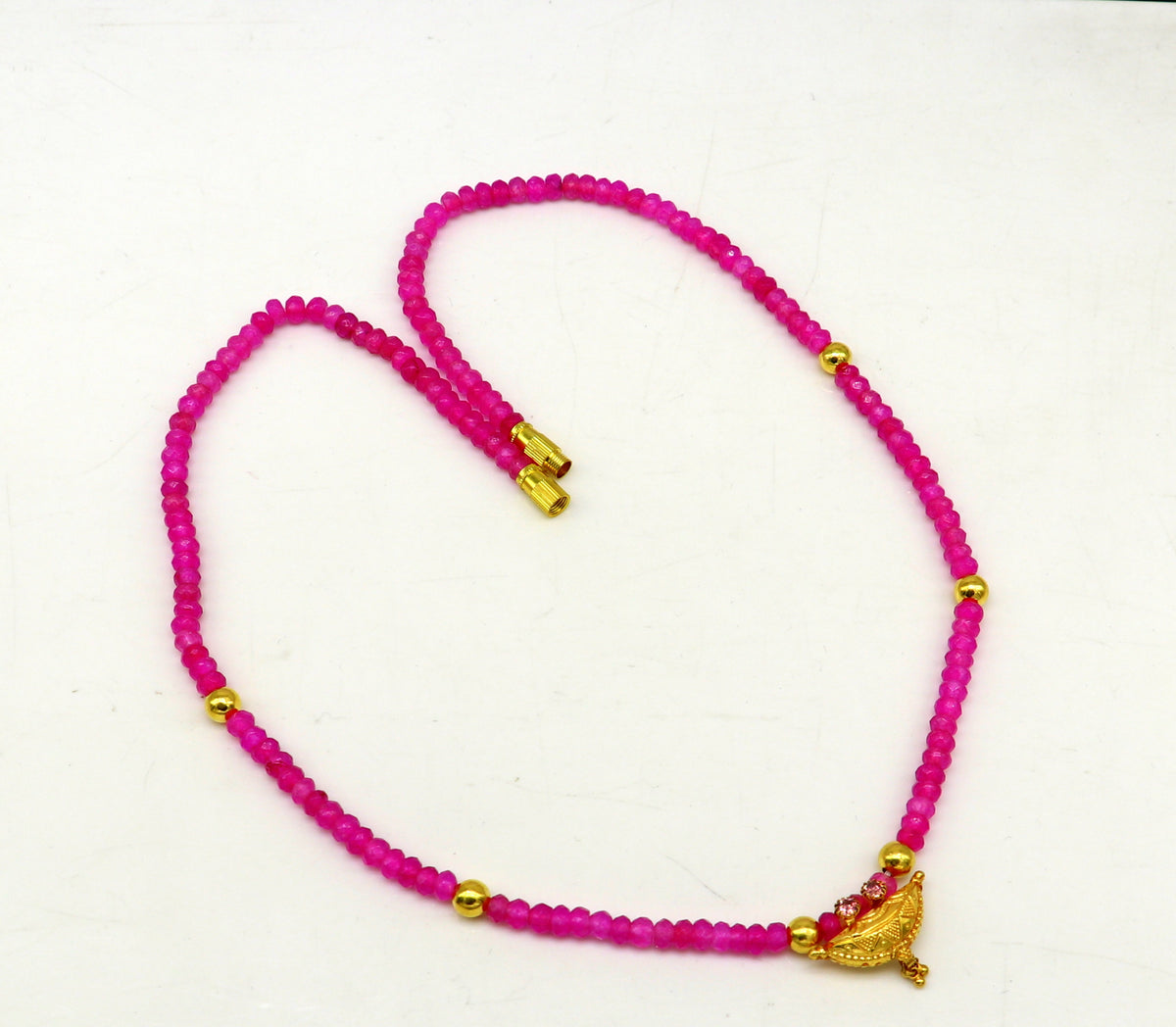 18-inch pink faceted beaded necklace with 20kt yellow gold tribal amulet pendant, vintage ethnic jewelry for brides or special occasions.