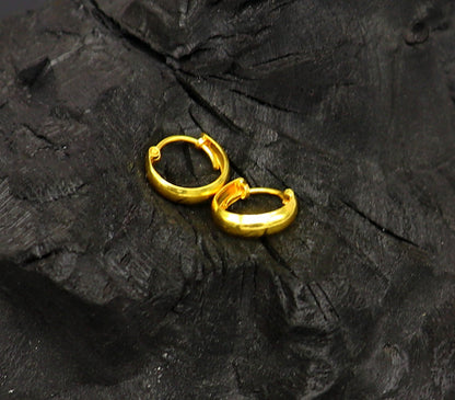 18kt yellow gold handmade custom huggie hoop earrings by Tribal Ornaments, clip-on bridal jewelry with fine detailing