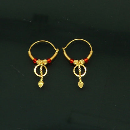 18kt yellow gold handmade vintage hoops earrings by TRIBAL ORNAMENTS, stylish designer jewelry for women and girls from India.