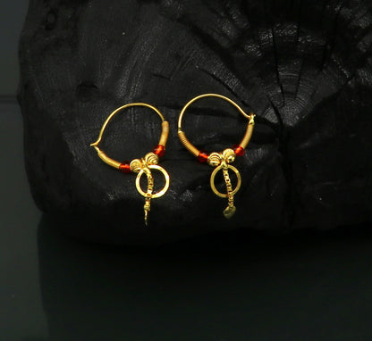 18kt yellow gold handmade vintage-style hoops earrings by TRIBAL ORNAMENTS, stylish designer jewelry for women and girls from India.