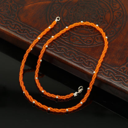 Sterling silver galaxy necklace with triple strands, semi-precious stone beads, and silver accents by TRIBAL ORNAMENTS.