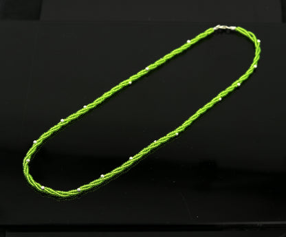 19-inch Tribal Ornaments beaded necklace with triple strands of yellow semiprecious beads and randomly placed 925 silver beads.