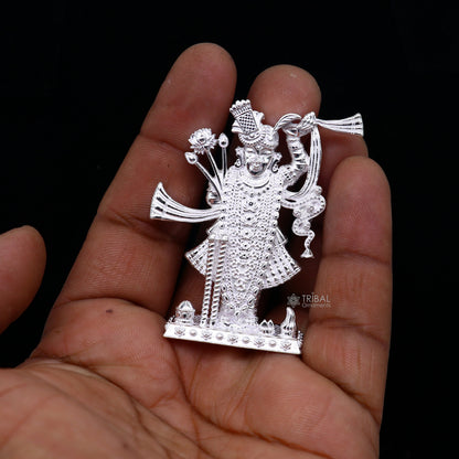 Sterling silver Lord Krishna Shrinathji idol figurine, handmade decorative puja statue for religious worship and gift-giving.