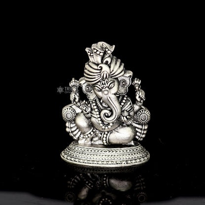 2.0-inch Sterling silver Lord Ganesha idol sculpture, detailed Ganesha figurine for puja and Diwali celebrations.