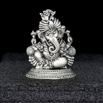 2.0-inch sterling silver Lord Ganesha idol by Tribal Ornaments, intricately detailed silver Ganesha sculpture for puja and Diwali celebrations.
