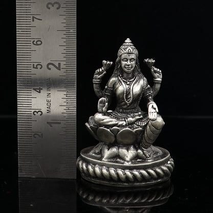TRIBAL ORNAMENTS 2.4-inch Goddess Lakshmi divine statue figurine for puja, representing wealth and prosperity for Diwali worship.