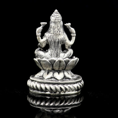 2.4-inch Goddess Lakshmi divine figurine for puja, hand-crafted by Tribal Ornaments, ideal for Diwali festival worship and prosperity.
