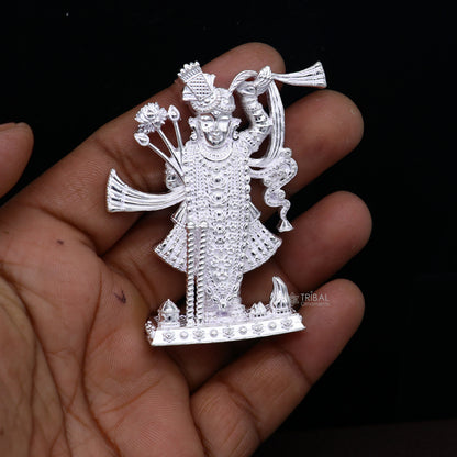 Sterling silver Lord Krishna Shrinathji idol figurine, handmade decorative puja statue for Diwali and spiritual rituals.