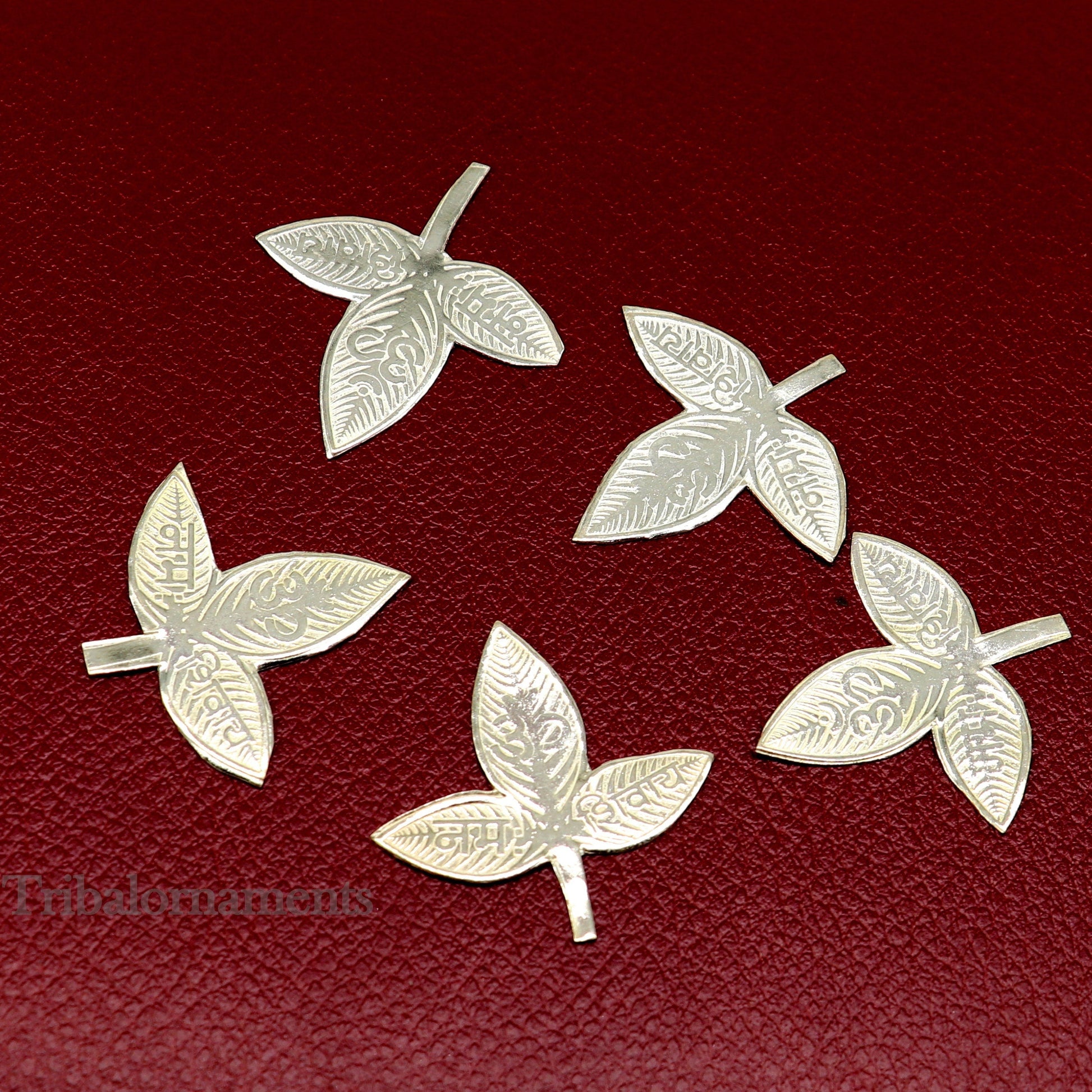 Solid silver 2.5 cm Bel Patra leaf for Lord Shiva worship, handmade Belva Patra for puja, tribal ornament from TRIBAL ORNAMENTS.