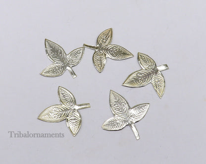 Solid silver 2.5 cm bel patra leaf for Lord Shiva worship, handmade by Tribal Ornaments, used in puja rituals.