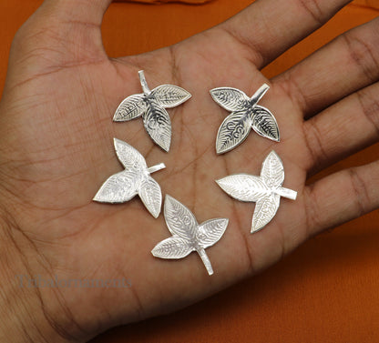 Solid silver 2.5 cm Bel Patra leaf from TRIBAL ORNAMENTS, handcrafted for Lord Shiva worship and puja rituals.