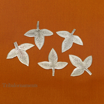 Solid silver 2.5 cm bel patra leaf for Lord Shiva puja, handmade tribal ornament for worship and spiritual rituals.