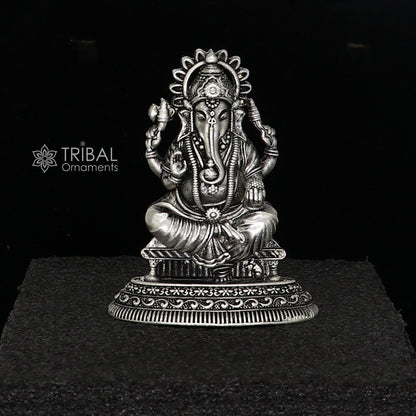 Sterling silver Lord Ganesha idol sculpture, 2.5-inch Ganesh figurine for puja and Diwali celebrations, crafted by TRIBAL ORNAMENTS.