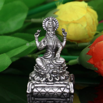TRIBAL ORNAMENTS 2-inch Goddess Lakshmi divine statue figurine for puja, symbolizing wealth and prosperity for Diwali festival worship.