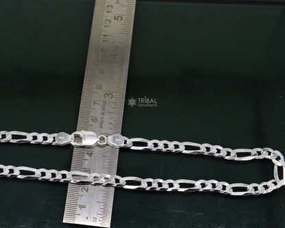 20-inch TRIBAL ORNAMENTS sterling silver 7mm solid Figaro chain for men, showcasing handcrafted jewelry design with silver links.