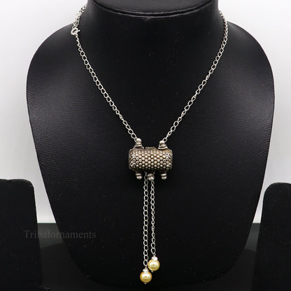 22-inch adjustable sterling silver chain necklace with antique tribal pendant, elegant jewelry piece for gifting or everyday wear.