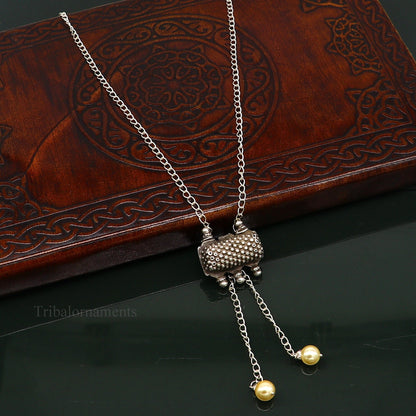 22-inch adjustable sterling silver chain necklace with antique tribal pendant, elegant jewelry piece suitable for gifting.