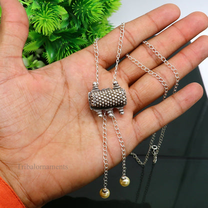 22-inch adjustable sterling silver chain necklace with an antique tribal pendant, elegant jewelry piece for gifting or everyday wear.