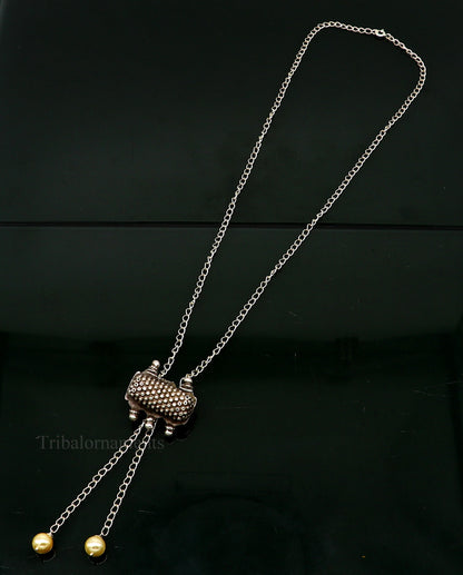 22-inch adjustable sterling silver chain necklace with an antique tribal pendant, elegant jewelry piece for gifting or everyday wear.