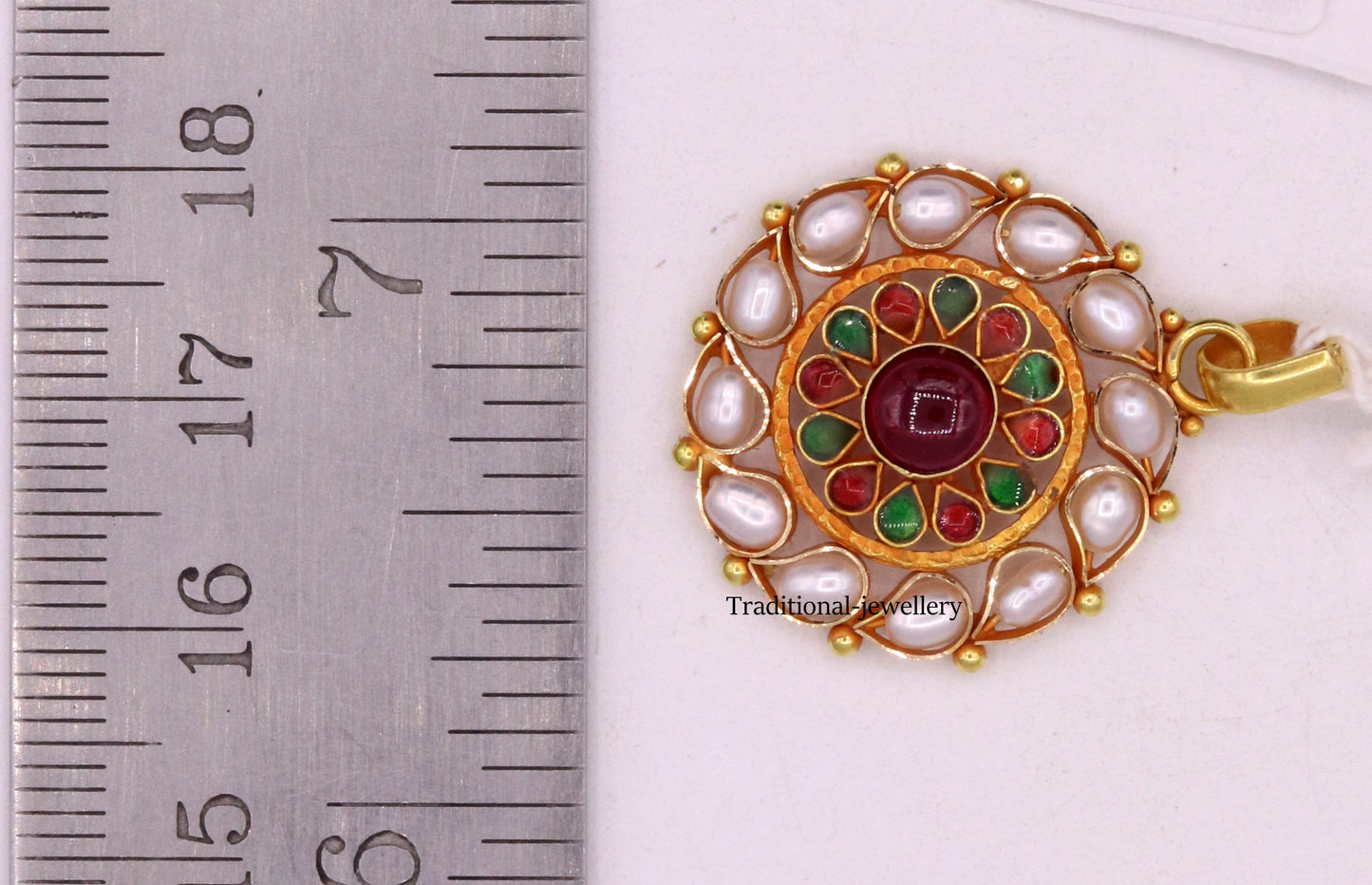 22K yellow gold vintage tribal pendant with pearl and red stone from Rajasthan tribal jewelry.
