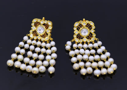 22K yellow gold handmade Kundan Jadau stud earrings with dangling pearls, perfect for bridal jewelry.