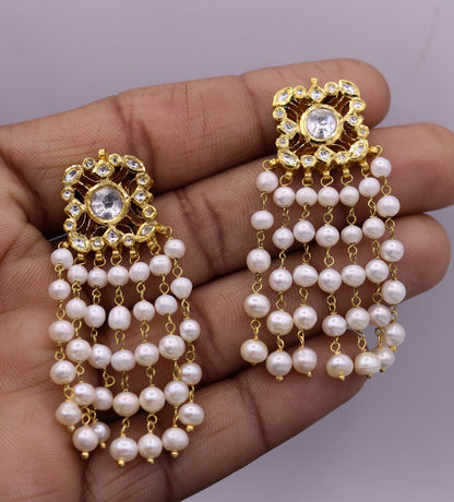 22K yellow gold handmade Kundan Jadau stud earrings with dangling pearls, perfect for bridal jewelry, by TRIBAL ORNAMENTS.