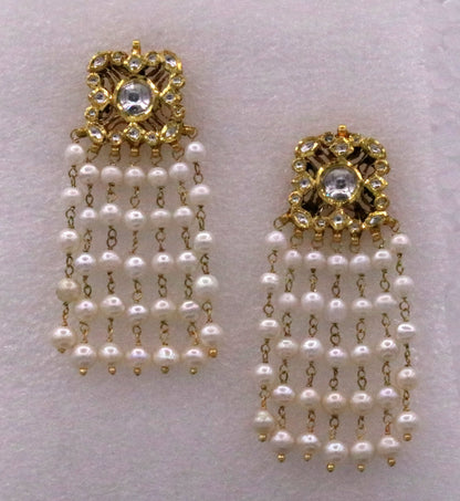 22K yellow gold handmade Kundan Jadau stud earrings with dangling pearls, intricate bridal jewelry by TRIBAL ORNAMENTS.