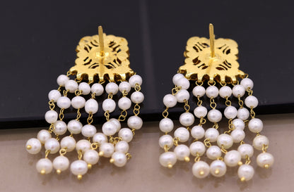 22K yellow gold handmade Kundan Jadau stud earrings with dangling pearls, intricate bridal jewelry by TRIBAL ORNAMENTS.
